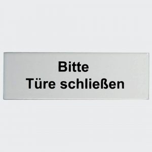 Bitte-Tuere-schliessen-flach-115x30mm